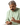 Man taking medicine with care, managing chronic health needs at home